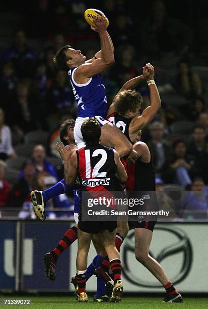 Saverio Rocca for the Kangaroos in action during the round 13 AFL match between the Kangaroos and Essendon Bombers at the Telstra Dome June 30, 2006...