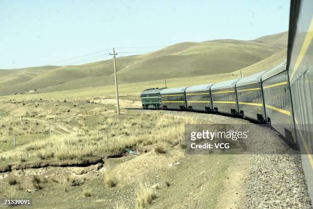 Onboard a train during a trial run of the 1,956-kilometer-long Qinghai-Tibet railway, linking Xining, capital of Qinghai Province, with Lhasa,...