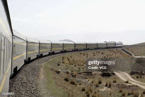 Onboard a train during a trial run of the 1,956-kilometer-long Qinghai-Tibet railway, linking Xining, capital of Qinghai Province, with Lhasa,...