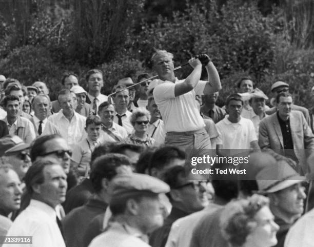 American golfer Jack Nicklaus driving on the fifth fairway at the British Open Golf Championships at Hoylake, 13th July 1967.