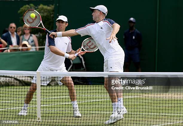 Kevin Ullyett of Zimbabwe and Paul Hanley of Australia in action in their match against Michael Kohlmann and Rainer Schuettler of Germany during day...