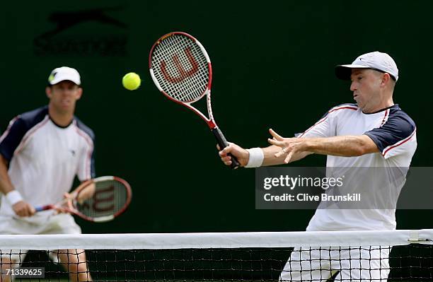 Kevin Ullyett of Zimbabwe and Paul Hanley of Australia in action in their match against Michael Kohlmann and Rainer Schuettler of Germany during day...