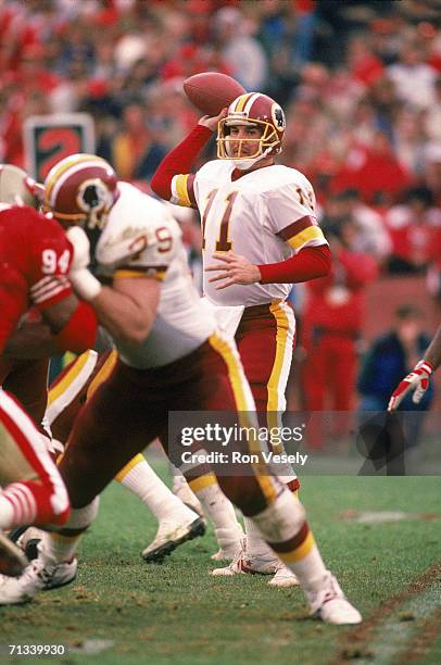 Quarterback Mark Rypien of the Washington Redskins passes against the San Francisco 49ers during the 1992 NFC Divisional Playoff at Candlestick Park...