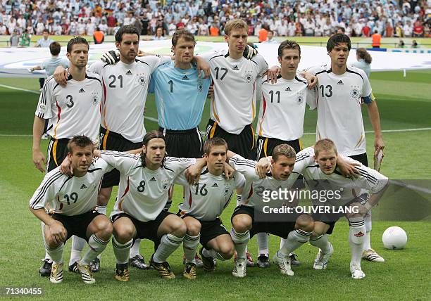 The German team pose at the start of the quarter-final World Cup football match between Germany and Argentina at Berlin's Olympic Stadium, 30 June...