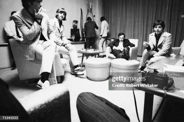 John Lennon, Ringo Starr, Beatles? road manager Neil Aspinall, George Harrison, Beatles manager Brian Epstein and Paul McCartney backstage at Tokyo?s...