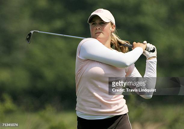Amateur Amanda Blumenherst watches her tee shot on the fourth hole during the first round of the 2006 Women's U.S. Open at Newport Country Club on...