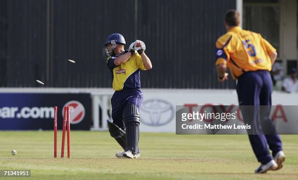 Heath Streak of Warwickshire bowls D Brown of Gloucestershire during the Twenty20 match between Warwickshire and Gloucestershire at Edgbaston on June...