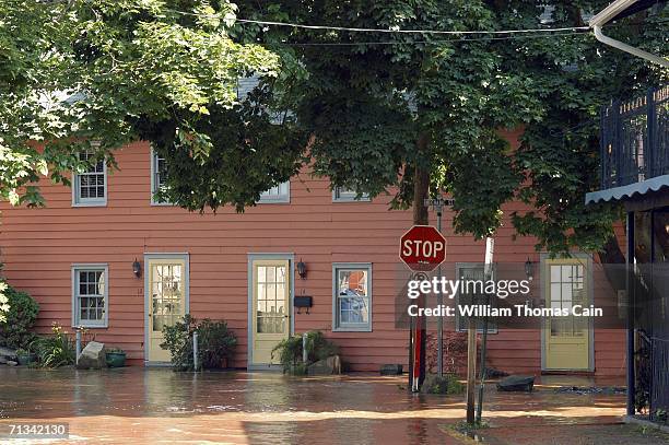 Streets remain flooded along the Delaware River as flood water starts to recede June 30, 2006 in New Hope, Pennsylvania. Damage estimates are in...