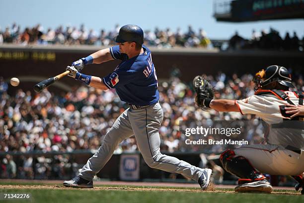 Hank Blalock of the Texas Rangers bats during the game against the San Francisco Giants at AT&T Park in San Francisco, California on June 29, 2006....