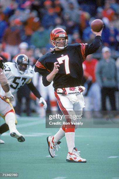 Quarterback Boomer Esiason of the Cincinnati Bengals passes against the Pittsburgh Steelers at Riverfront Stadium on November 10, 1991 in Cincinnati,...