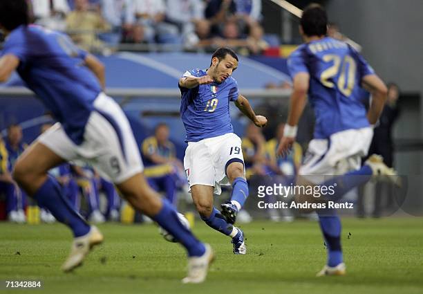 Gianluci Zambrotta of Italy shoots, and scores the opening goal during the FIFA World Cup Germany 2006 Quarter-final match between Italy and Ukraine...