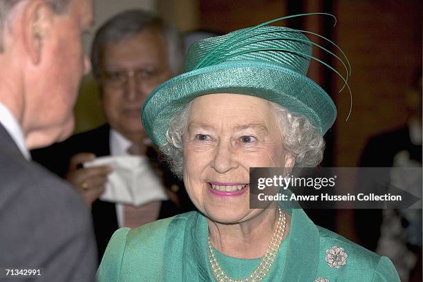 Queen Elizabeth ll smiles during a visit to the Royal Commonwealth Society on June 30, 2006 in London, England.