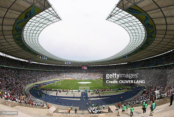 This general view shows the crowd during the quarter-final World Cup football match between Germany and Argentina at Berlin's Olympic Stadium, 30...