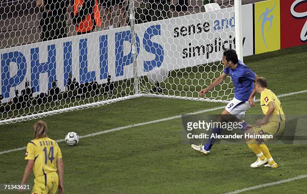 Luca Toni of Italy scores his team's third goal during the FIFA World Cup Germany 2006 Quarter-final match between Italy and Ukraine at the Stadium...