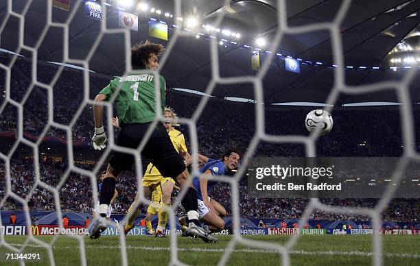 Luca Toni of Italy scores his team's second goal past Goalkeeper Oleksandr Shovkovskyi of the Ukraine during the FIFA World Cup Germany 2006...