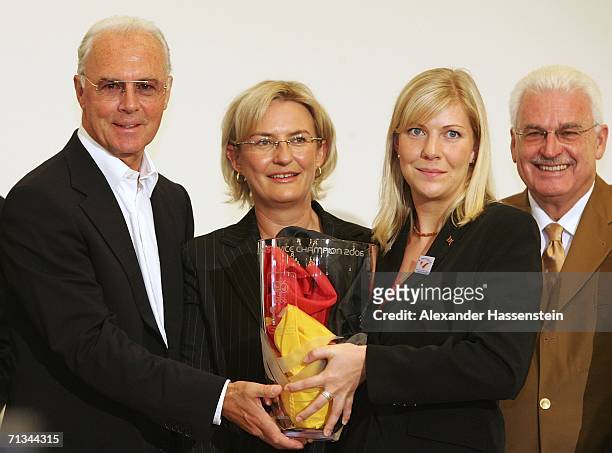 Franz Beckenbauer, president of the German World Cup 2006 Organising Committee, Petra Hedorfer, CEO of the German Natinal Tourist Board, Claudia...