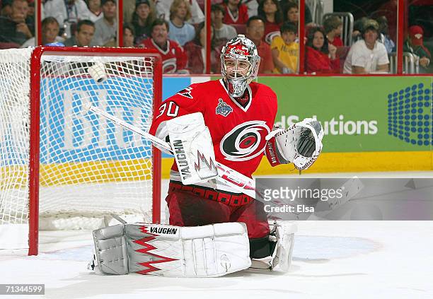 Goaltender Cam Ward of the Carolina Hurricanes drops to his leg pads to make a save against the Edmonton Oilers during game five of the 2006 NHL...