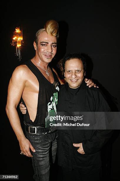 Designers John Galliano and Azzedine Alaia pose for a photograph during the Galliano Men's Fashion Show Spring - Summer 2007 June 30, 2006 in Paris,...