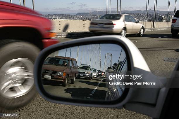 People drive over the Bay Bridge into San Francisco at the beginning of the 4th of July holiday weekend on June 30, 2006 in San Francisco,...