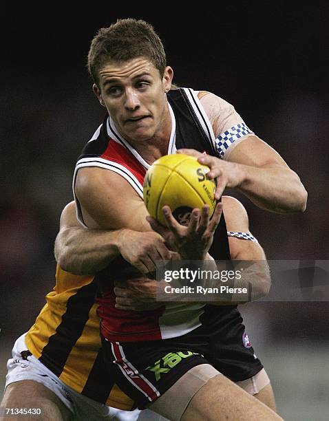 Matt Maguire of the Saints in action during the round thirteen AFL match between the St Kilda Saints and the Hawthorn Hawks at the Telstra Dome July...