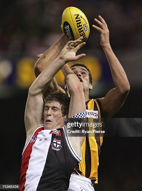 Nick Dal Santo of the Saints competes for the ball against Lance Franklin of the Hawks during the round thirteen AFL match between the St Kilda...