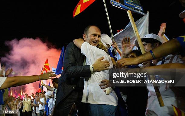 Vlado Buchkovski, the Macedonian Prime Minister and the leader of the ruling party SDSM, greets supporters at the election rally in Skopje, 30 June...
