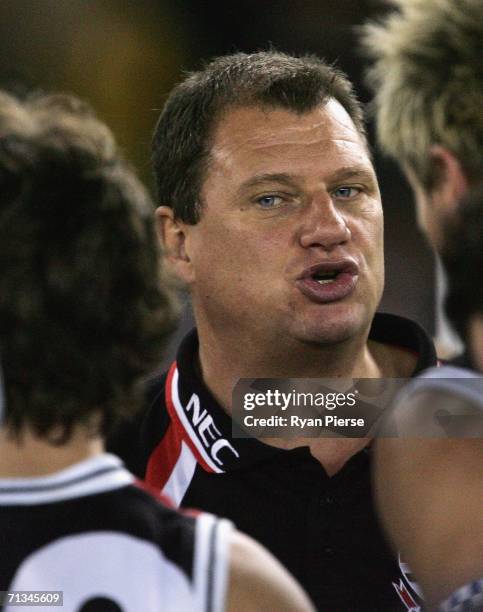 Grant Thomas, Coach of the Saints, addresses his players during the round thirteen AFL match between the St Kilda Saints and the Hawthorn Hawks at...