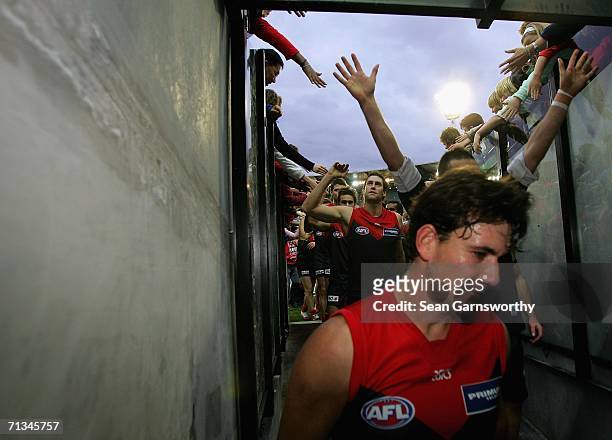 Matthew Whelan for Melbourne returns to the rooms after winning the round thirteen AFL match between Melbourne and Port Adelaide at the Melbourne...