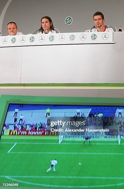 Harald Stenger, media Director of the German Soccer Federation, and german players Torsten Frings and Arne Friedrich attend the German National Team...