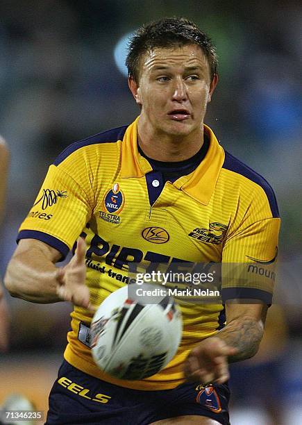 Tim Smith of the Eels passes during the round 17 NRL match between the Canberra Raiders and the Parramatta Eels played at Canberra Stadium on July 1,...