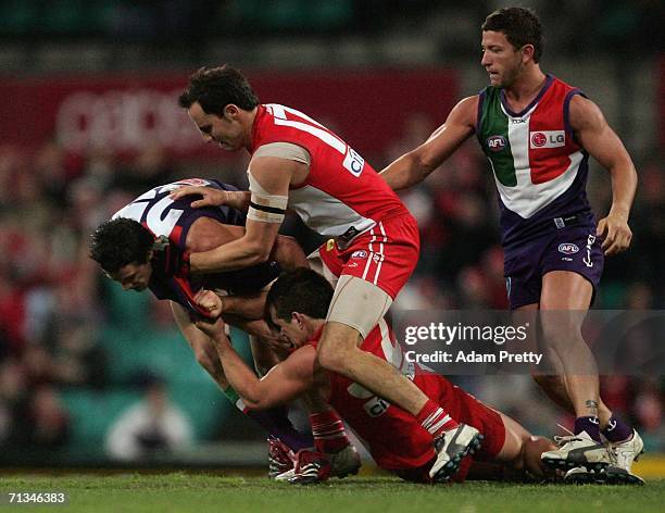 Amon Buchanan of the Swans has an altercation with Steven Dodd of the Dockers the AFL Round thirteen match between the Sydney Swans and the Fremantle...