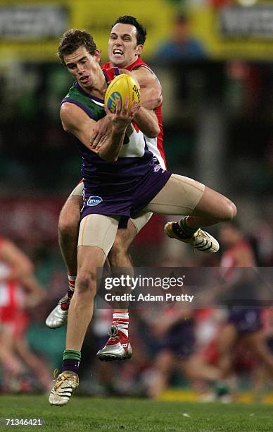 Marcus Drum of the Dockers marks during the AFL Round thirteen match between the Sydney Swans and the Fremantle Dockers at the Sydney Cricket Ground...