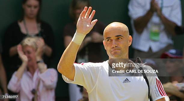 United Kingdom: US Andre Agassi arrives in Centre Court to play against Rafael Nadal of Spain during the 3rd round of the Wimbledon Tennis...