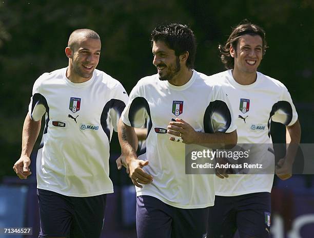 Alessandro Del Piero, Gennaro Gattuso and Cristian Zaccardo run during an Italy National Football Team training session on July 01, 2006 in Duisburg,...