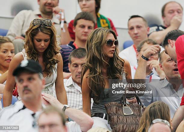 Cheryl Tweedy and Victoria Beckham take their seats prior to the FIFA World Cup Germany 2006 Quarter-final match between England and Portugal played...