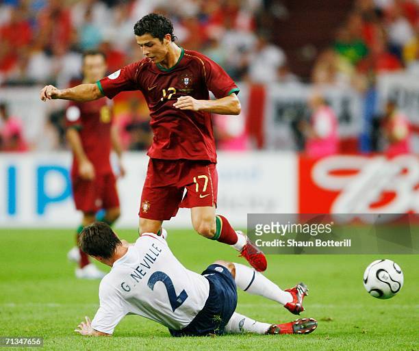 Gary Neville of England tackles Cristiano Ronaldo of Portugal during the FIFA World Cup Germany 2006 Quarter-final match between England and Portugal...