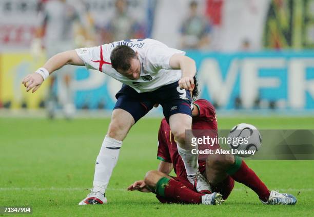 Wayne Rooney of England stamps on Ricardo Carvalho of Portugal during the FIFA World Cup Germany 2006 Quarter-final match between England and...