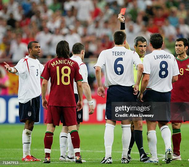 Wayne Rooney of England is shown a red card by Referee Horacio Elizondo of Argentina during the FIFA World Cup Germany 2006 Quarter-final match...