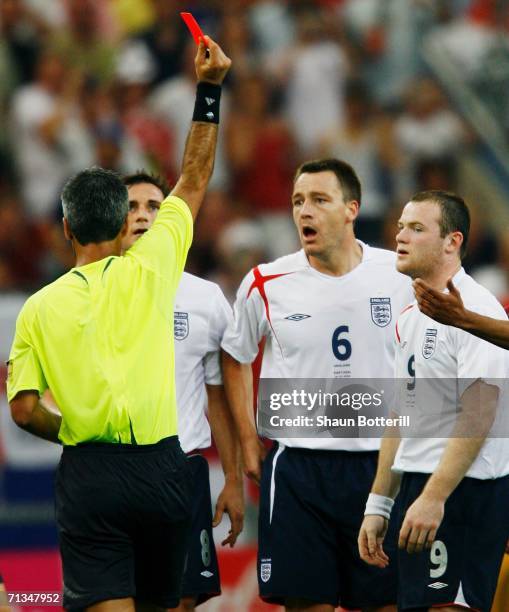 Wayne Rooney of England is shown a red card by Referee Horacio Elizondo of Argentina during the FIFA World Cup Germany 2006 Quarter-final match...
