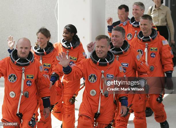 Pilot Mark Kelly, Mission Specialists Lisa Nowak, Stephanie Wilson, Commander Steve Lindsey, Mission Specialists Mike Fossum, Thomas Reiter, a German...