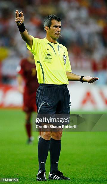 Referee Horacio Elizondo of Argentina gestures during the FIFA World Cup Germany 2006 Quarter-final match between England and Portugal played at the...