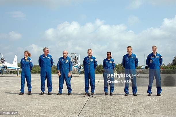 In this handout photo provided by NASA, the STS-121 crew Mission Specialists Lisa Nowak and Michael Fossum, Pilot Mark Kelly, Commander Steven...
