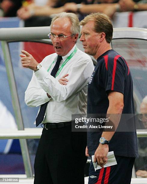 Manager of England Sven Goran Eriksson and his assistant Steve McClaren discuss tactics during the FIFA World Cup Germany 2006 Quarter-final match...