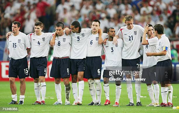 The England players line up following Frank Lampard's penalty miss in a penalty shootout during the FIFA World Cup Germany 2006 Quarter-final match...