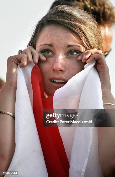 An English football fan cries after England lose to Portugal in the quarter finals of the FIFA World Cup.on July 1, 2006 in Gelsenkirchen, Germany....