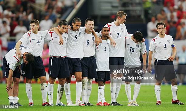 The England players stand together during a penalty shootout during the FIFA World Cup Germany 2006 Quarter-final match between England and Portugal...