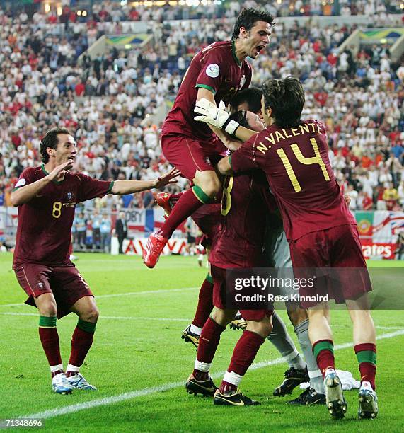 The Portugal players celebrate following their victory in a penalty shootout at the end of the FIFA World Cup Germany 2006 Quarter-final match...