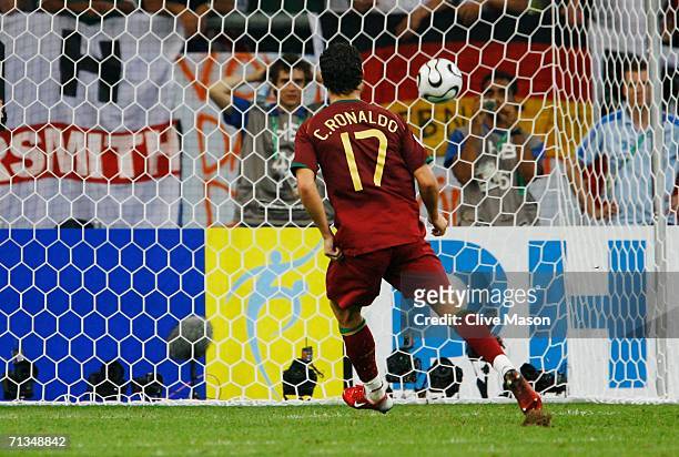 Cristiano Ronaldo of Portugal scores the winning penalty in a penalty shootout at the end of the FIFA World Cup Germany 2006 Quarter-final match...