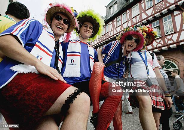 French football fans pose on July 1, 2006 in Frankfurt, Germany. France play Brazil in the FIFA World Cup 2006 Quarter final in Frankfurt.