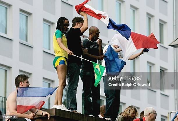 French and Brazilian football fans wave their flags on July 1, 2006 in Frankfurt, Germany. France play Brazil in the FIFA World Cup 2006 Quarter...